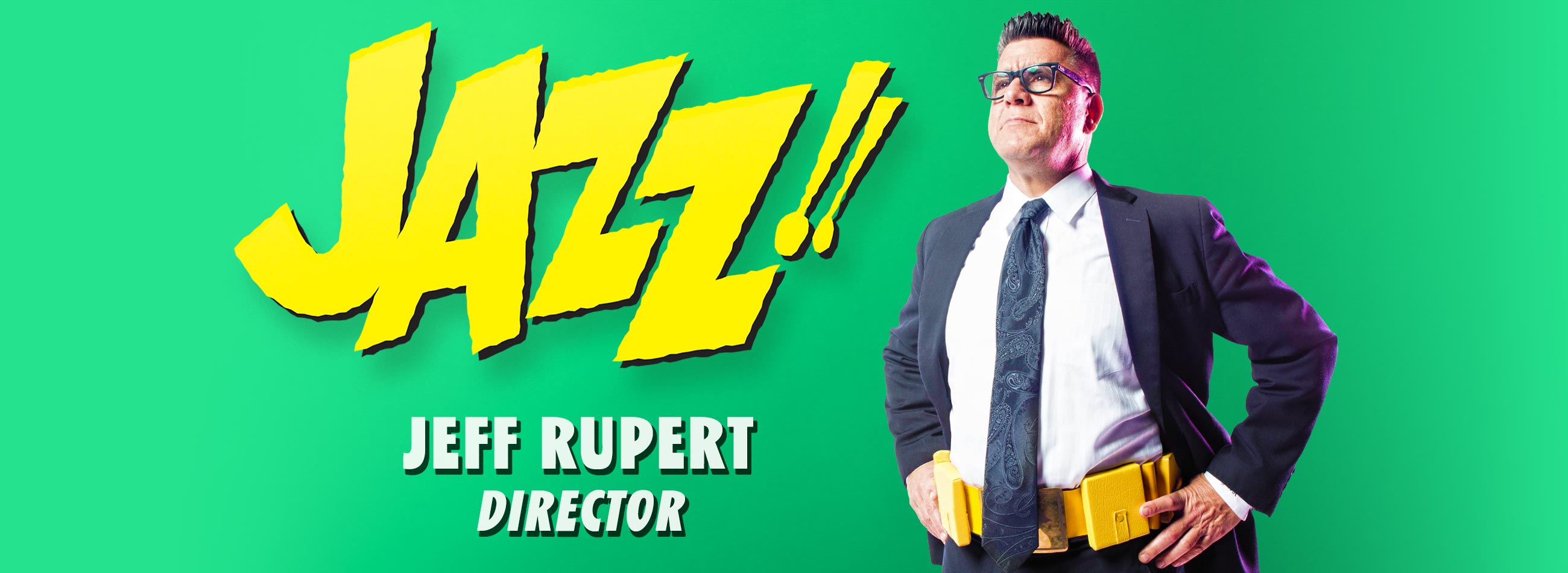 Director Jeff Rupert wears a utility belt next to JAZZ! text