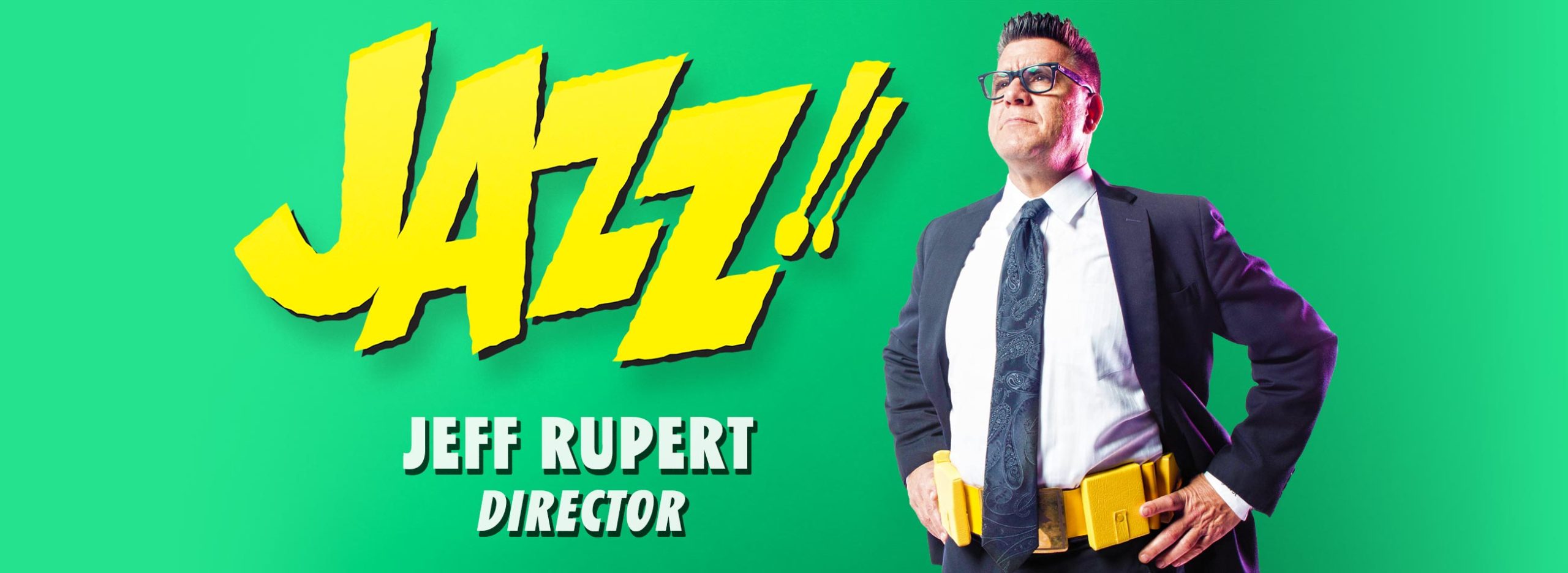 Director Jeff Rupert wears a utility belt next to comic-style rendering of the word JAZZ!